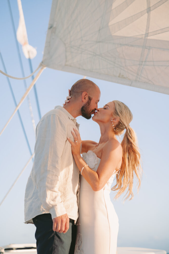 Couple enjoying a romantic moment on a yacht by the sea