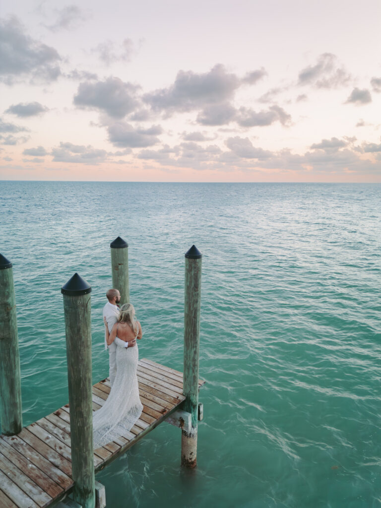 Couple enjoying a timeless romance moment by the sea at Casa Marina