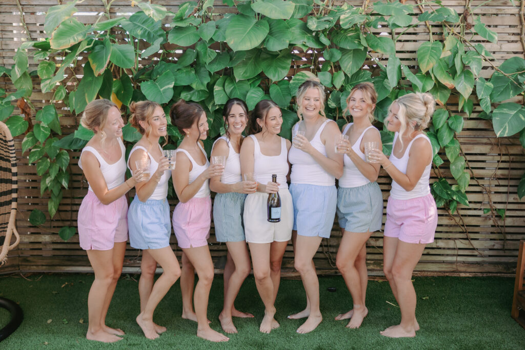 Bride with her bridesmaids during the getting ready moments at her dream wedding at the Hemingway House Museum.