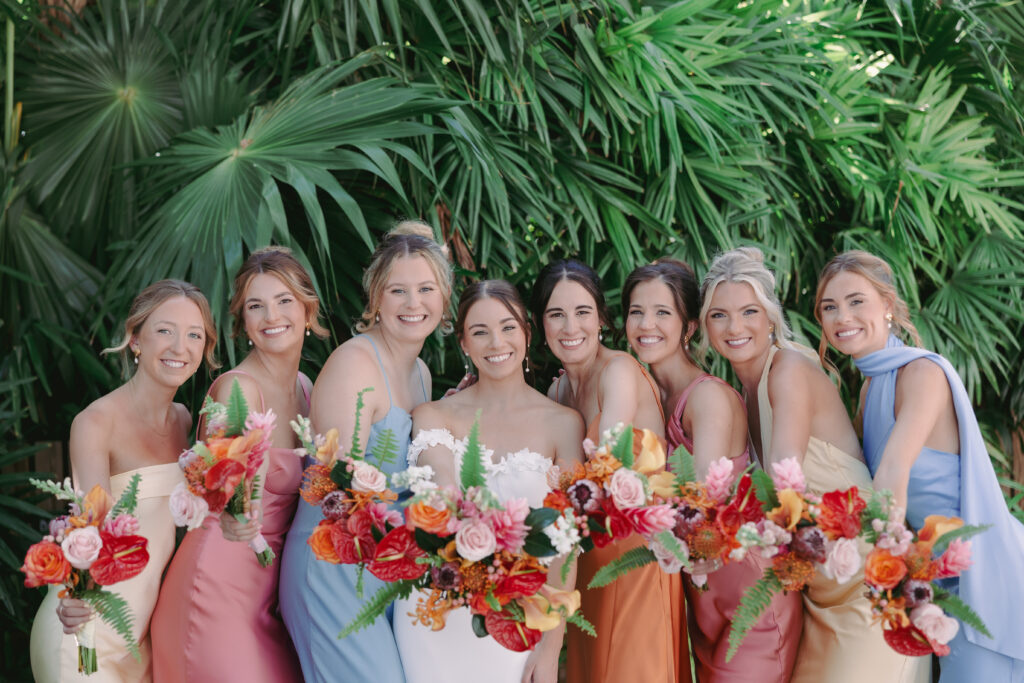 Bride with her bridesmaid at her dream wedding at the Hemingway House Museum.