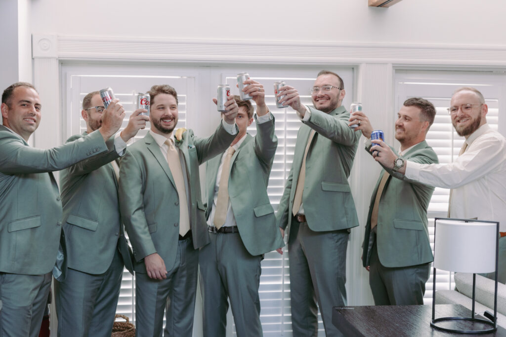 Groom with his groom's men during the getting ready moments at his dream wedding at the Hemingway House Museum.