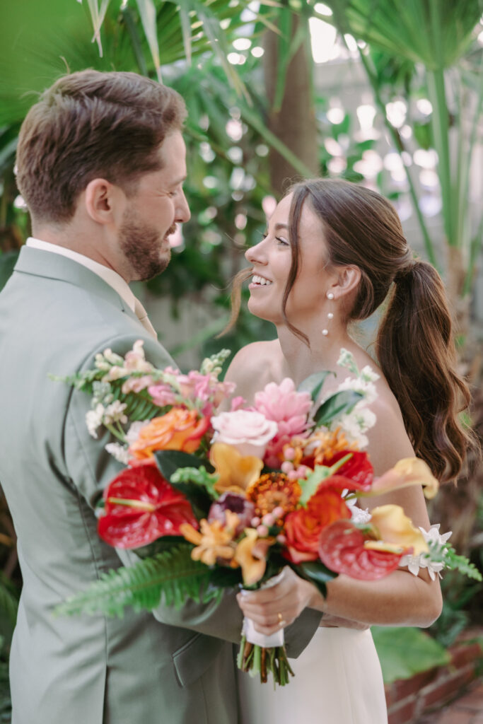 Couple’s first look at their dream wedding at the Hemingway House Museum, capturing an unforgettable moment.