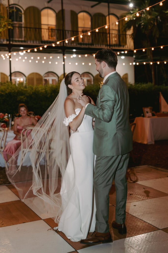 Couple during their first dance at their dream wedding at the Hemingway House Museum.