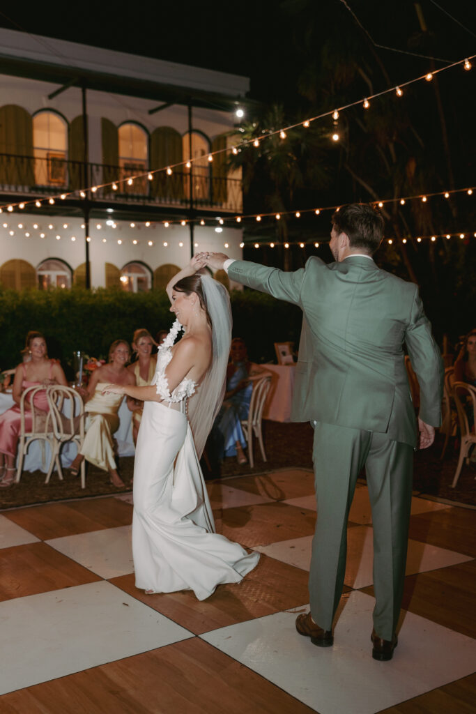 Couple during their first dance at their dream wedding at the Hemingway House Museum.