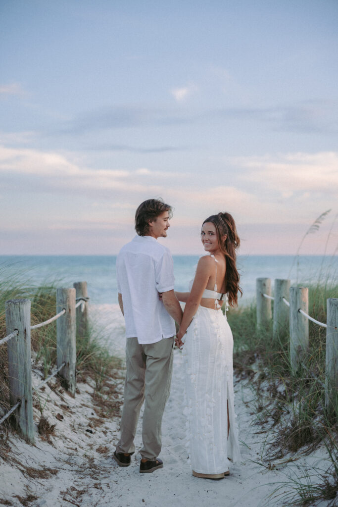 Couple walking hand in hand during their Lifestyle Session in the Florida Keys.
