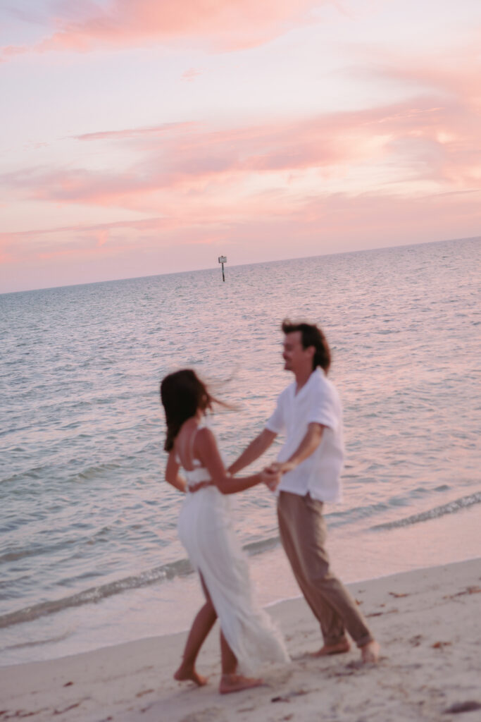 Couple sharing a dance by the ocean during their Lifestyle Session in the Florida Keys.