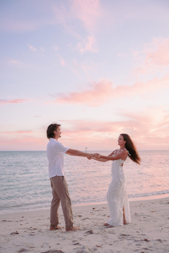 Couple sharing a dance by the ocean during their Lifestyle Session in the Florida Keys.