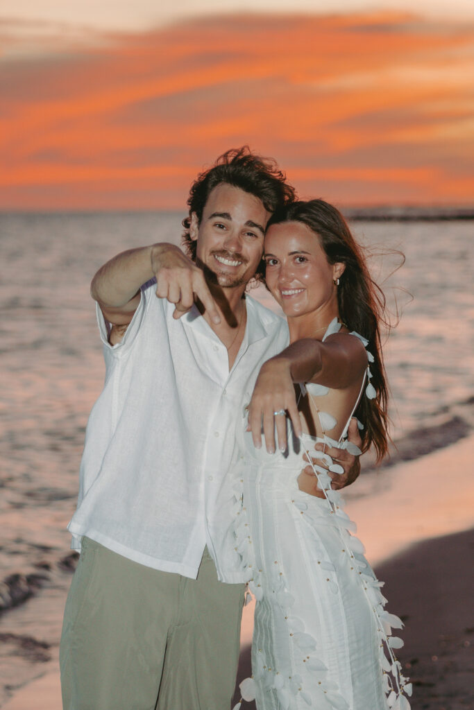Couple's romantic sunset moment by the shoreline during a Lifestyle Session in the Florida Keys.