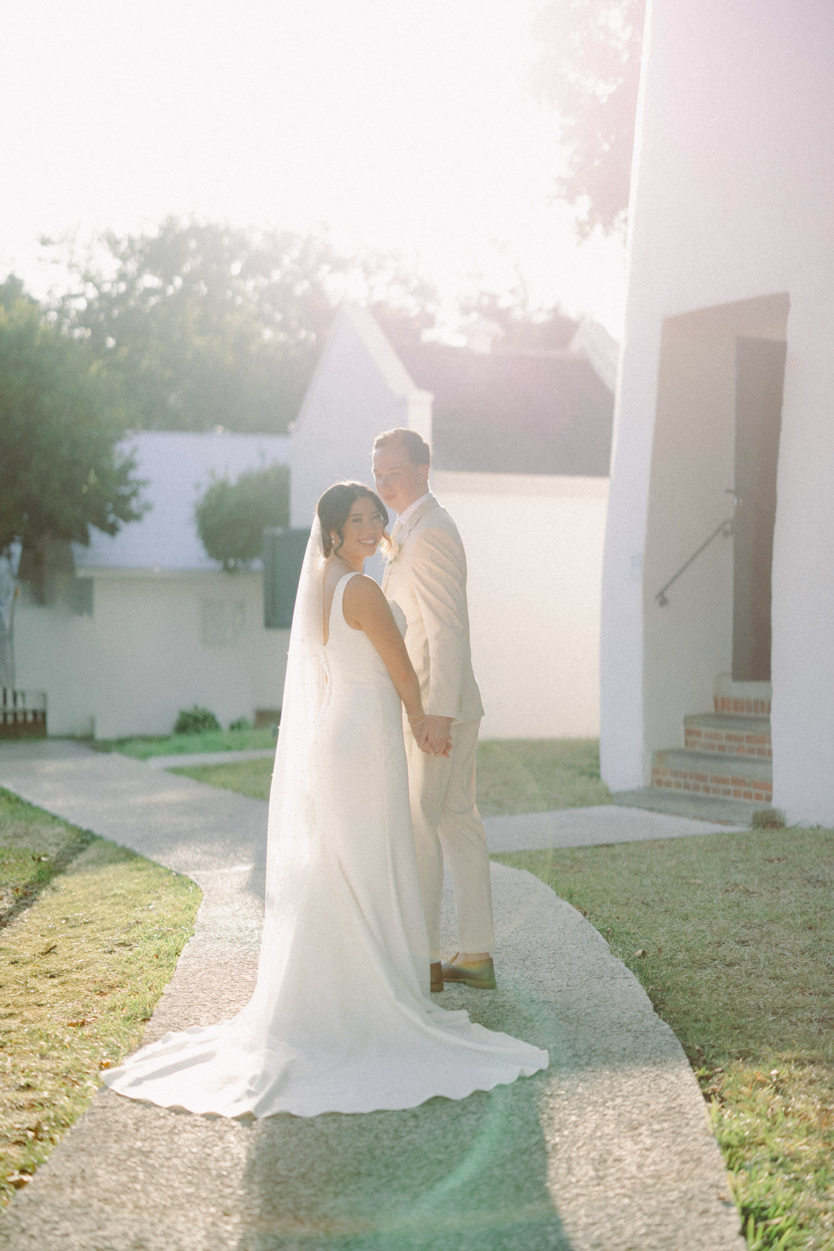 Bride and groom during their first look at the Historic Key West Lighthouse captured on film