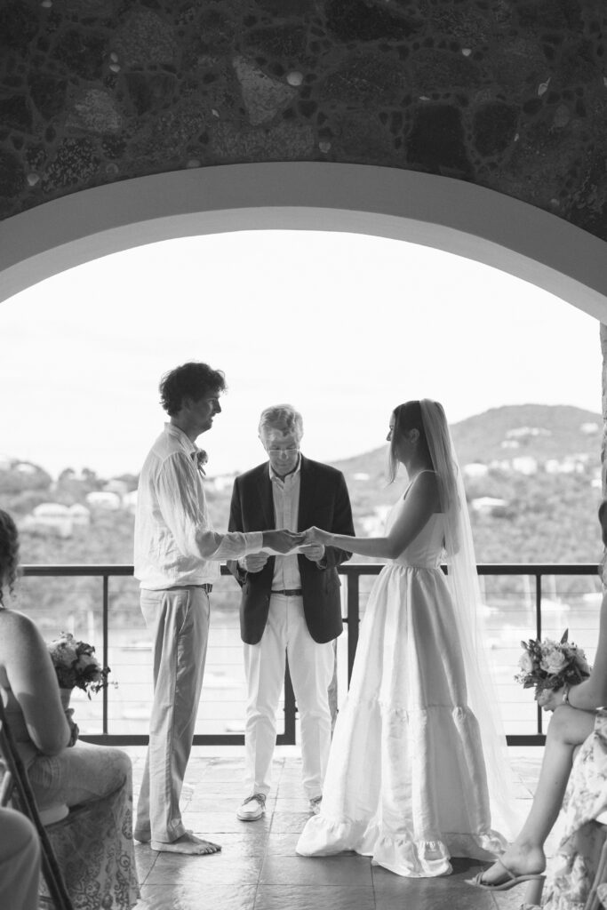 Couple exchanging vows at a Cruz Bay villa during their St John USVI wedding