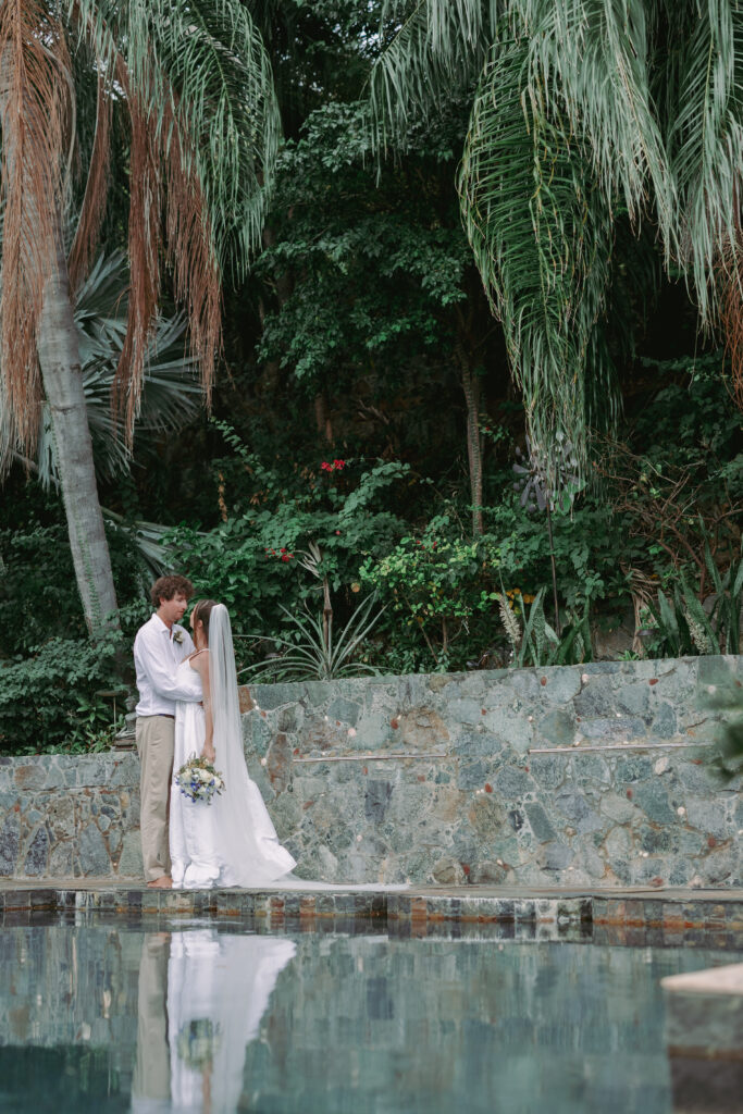 Bride and groom embracing at a Cruz Bay villa during their St John USVI wedding
