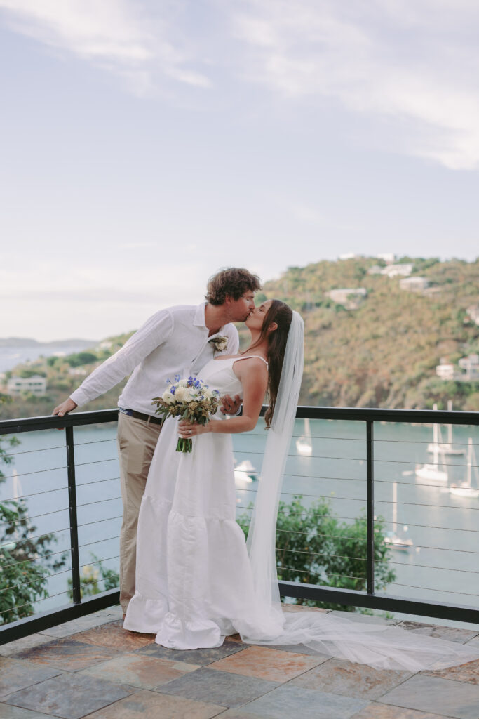 Couple kissing after their st john virgin islands wedding