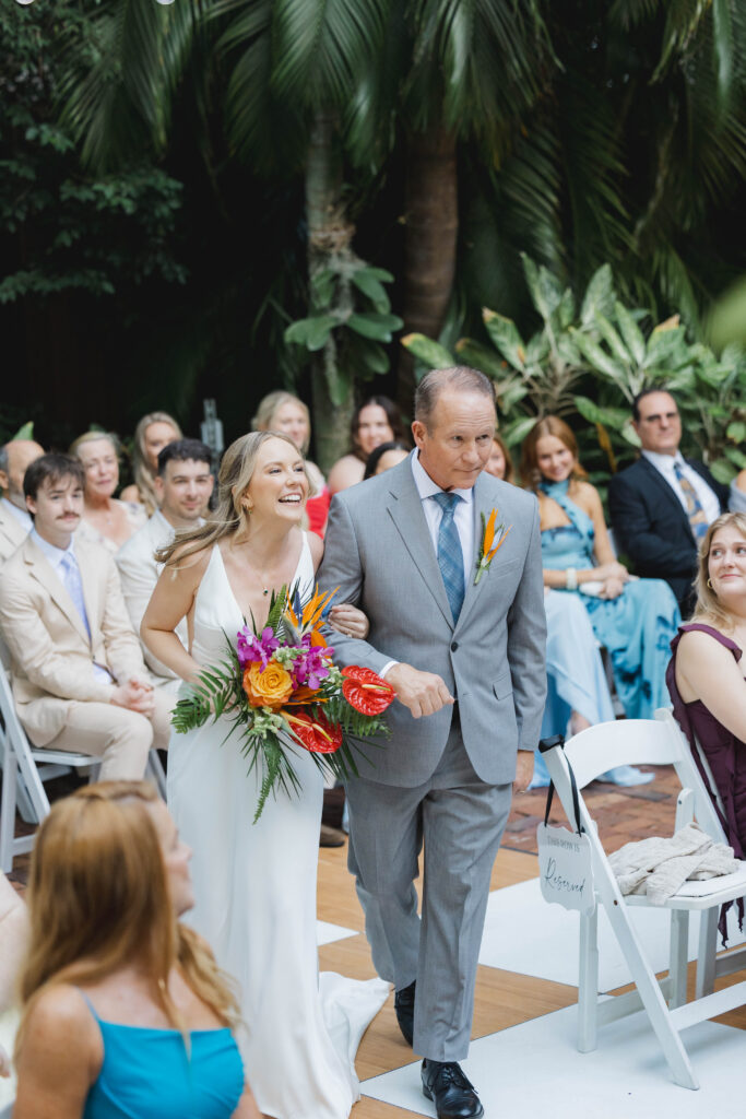 Father walking his bride down the aisle
