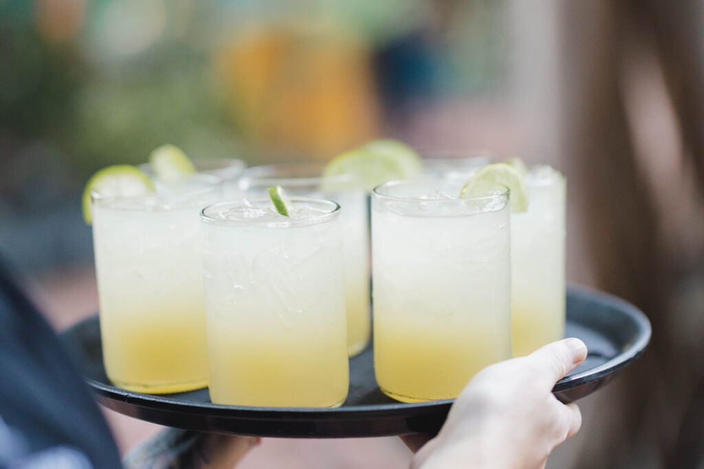Tray of margaritas being served during a wedding reception