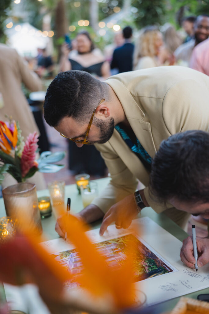 Guests signing the guestbook