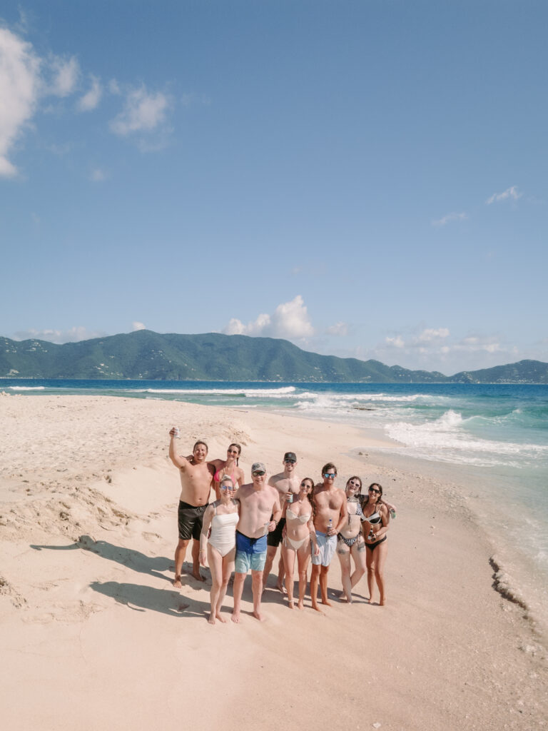 Wedding guests on the beach between stops in the British Virgin Islands