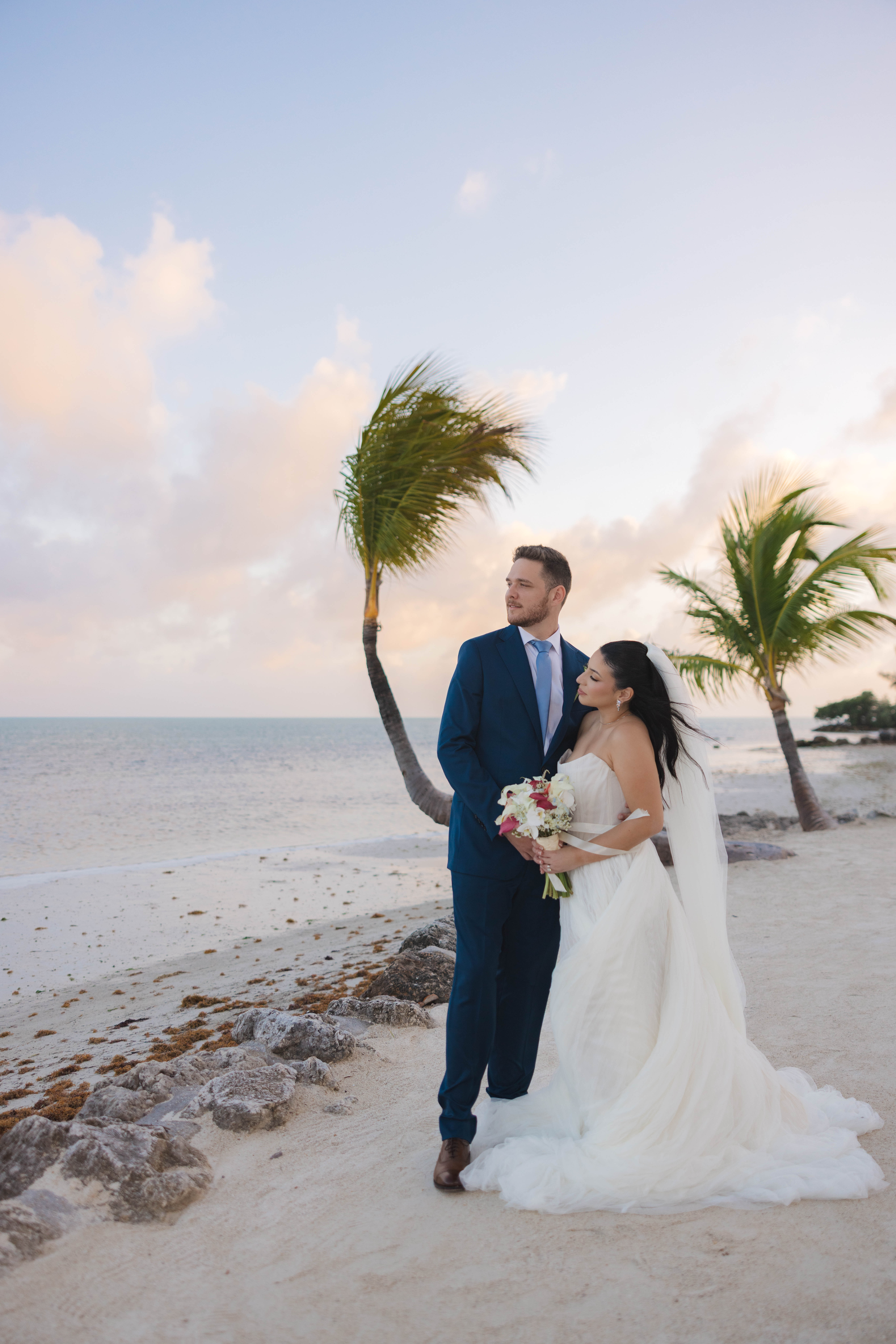 Bride and groom on the beach after their Cheeca Lodge wedding ceremony