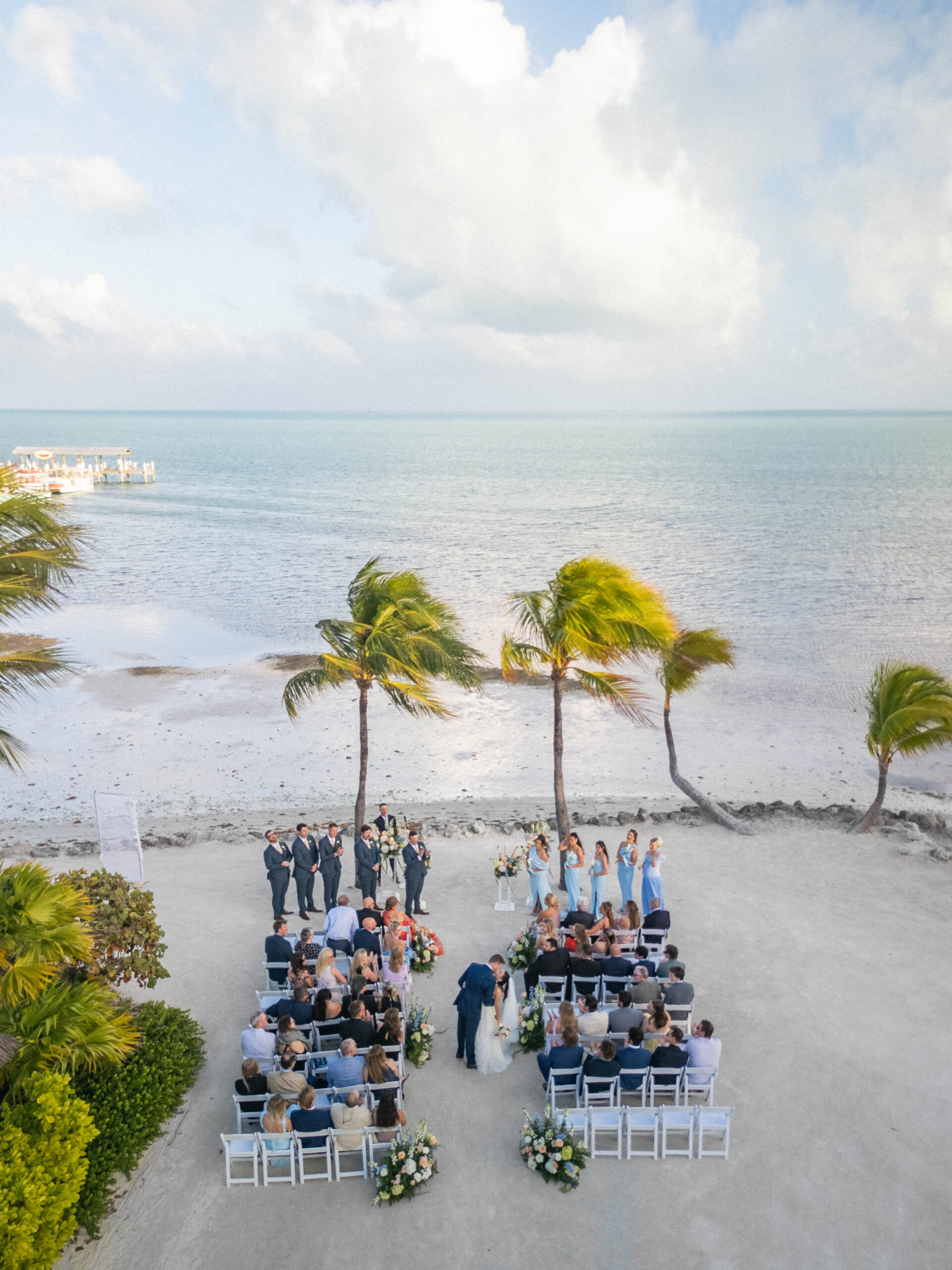 Bride and groom on the beach during their Cheeca Lodge wedding ceremony