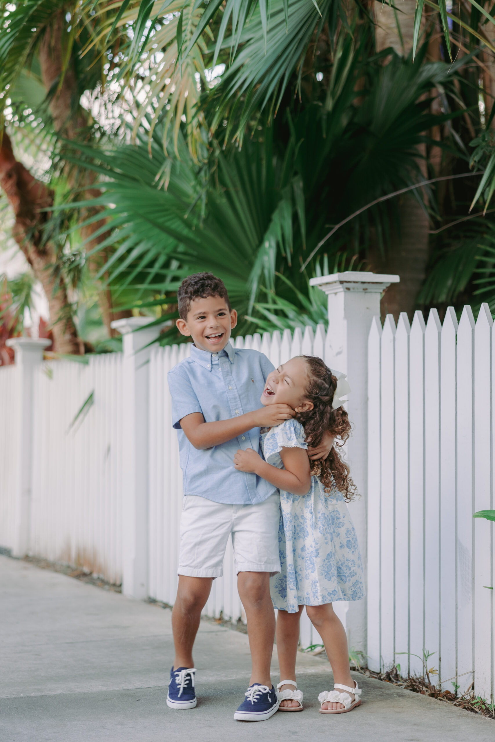 Key West family photographer candidly capturing kids playing