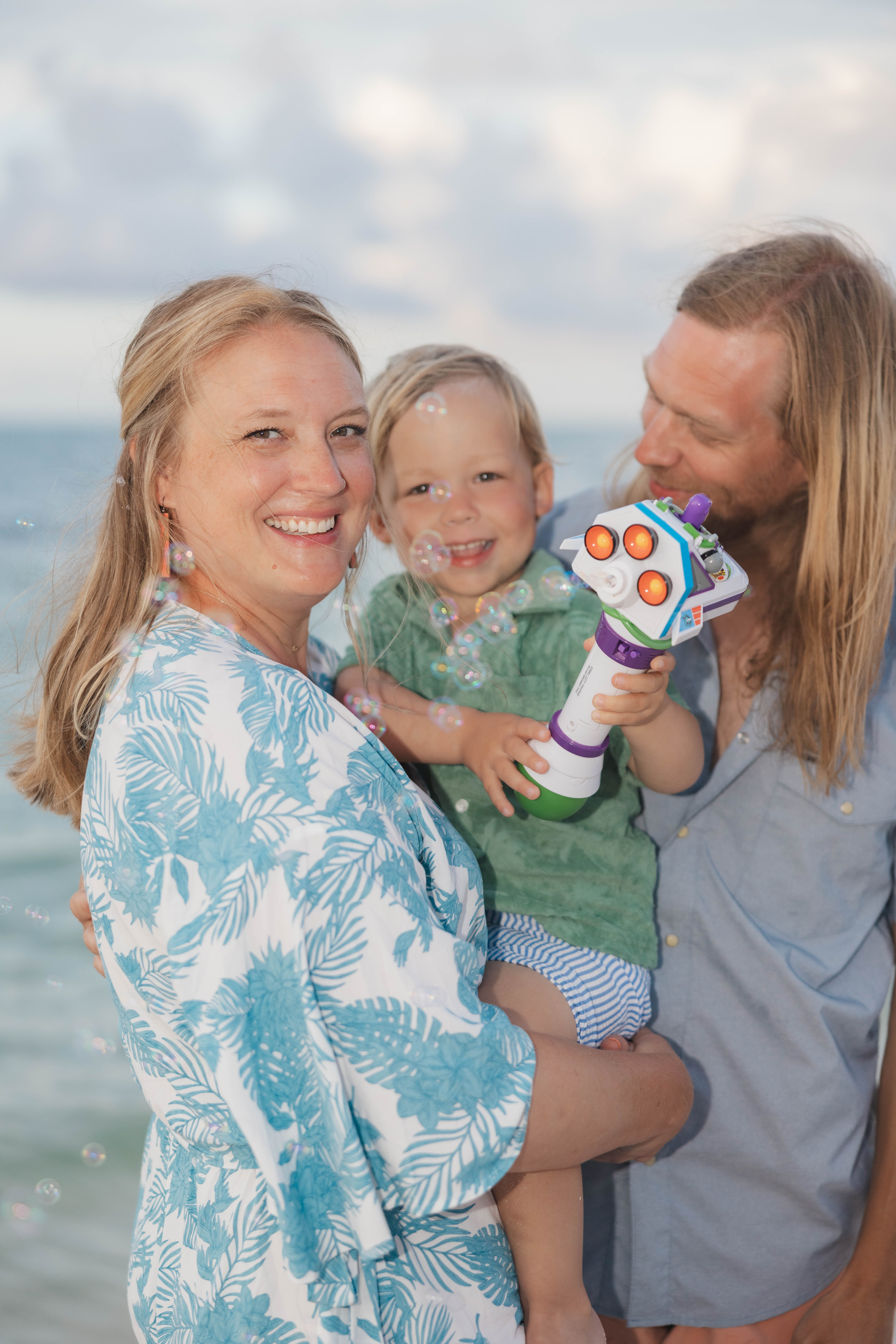 Key West family photographer candidly capturing a family on the beach