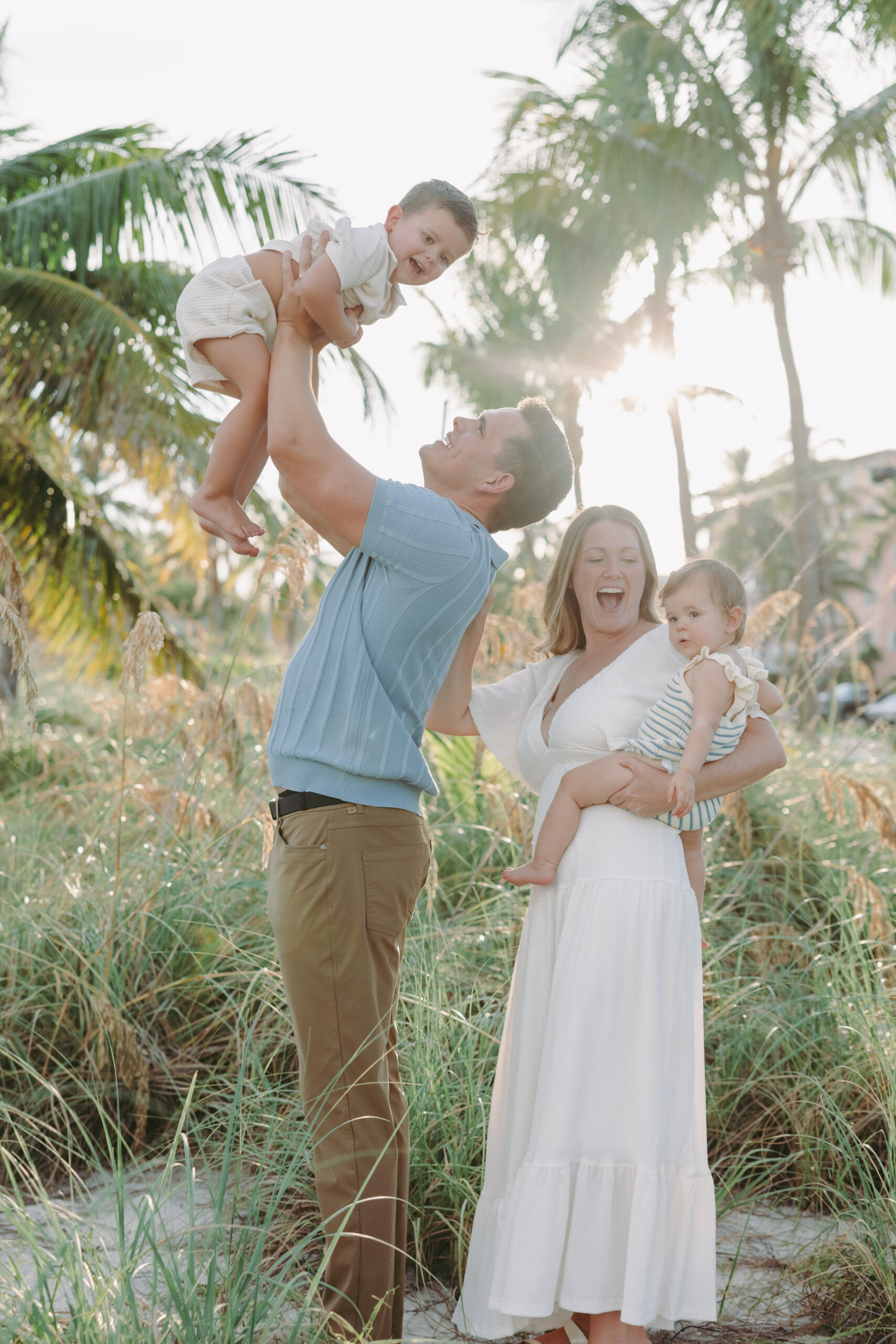 Key West family photographer candidly capturing a family on the beach