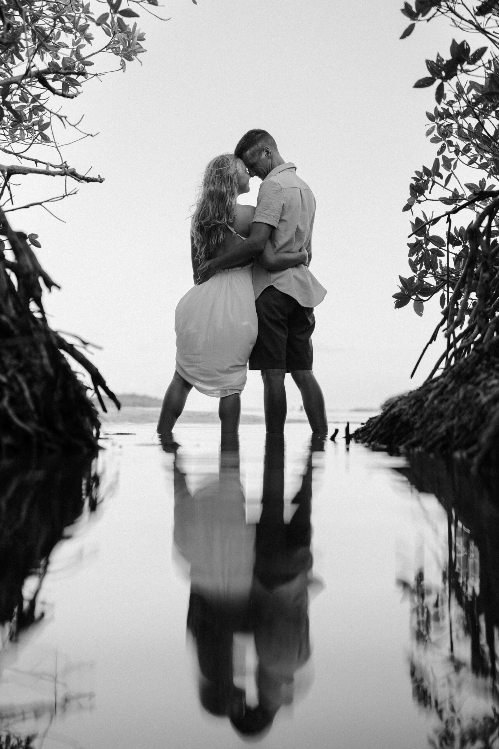 Couple wading at a private sandbar during a Key West sunset sandbar session