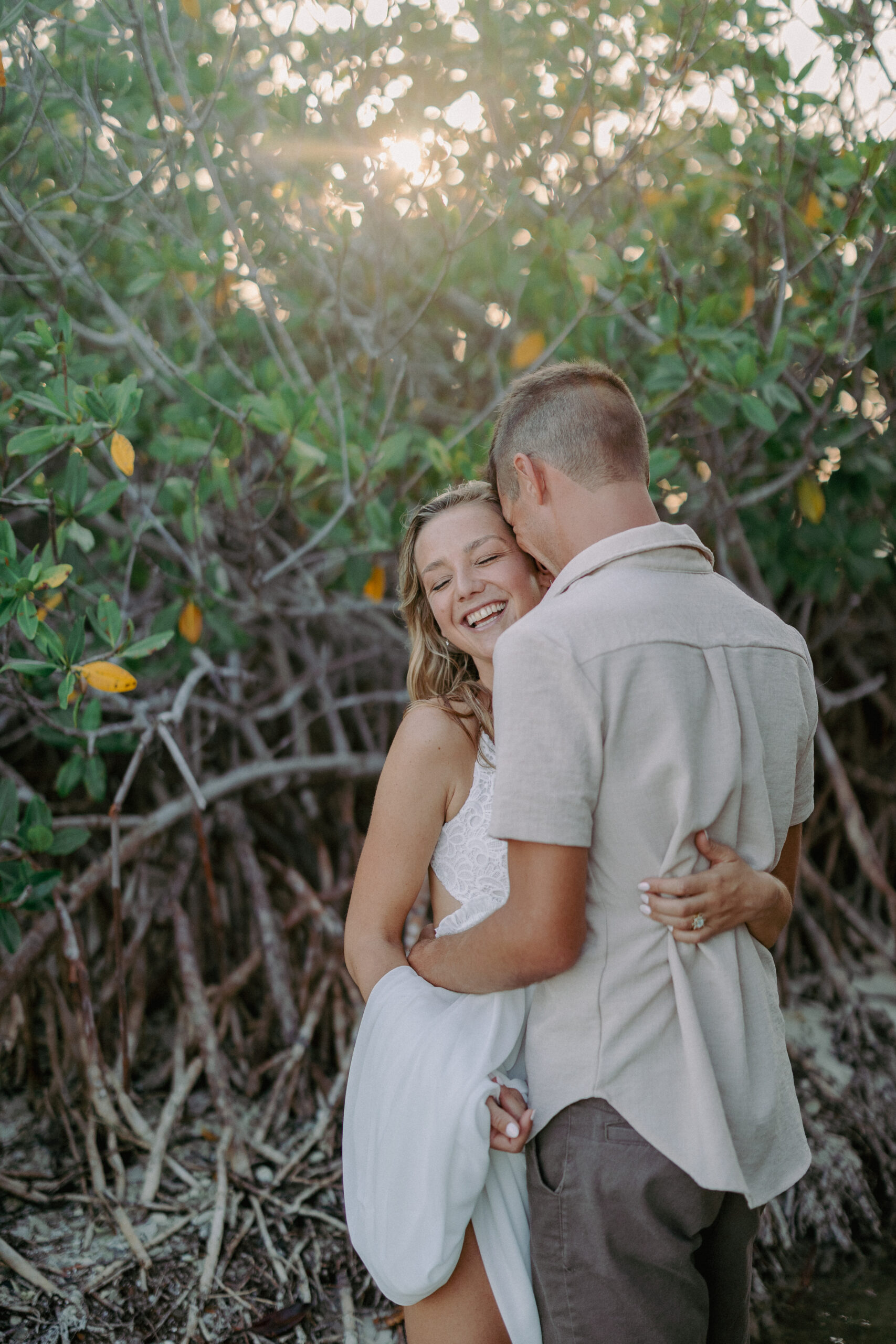 Couple wading at a private sandbar during a Key West sunset sandbar session