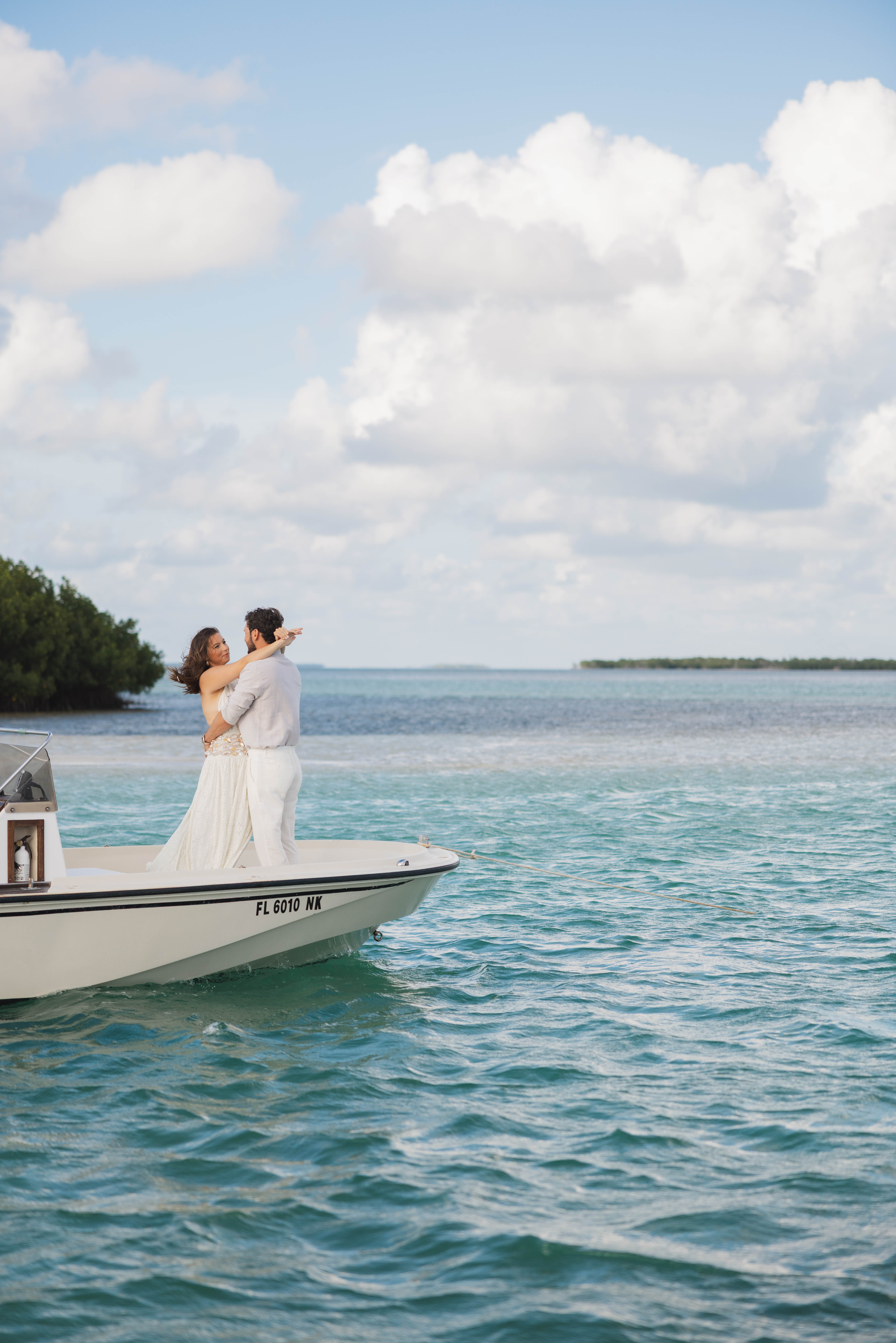Private charter boat crossing the backcountry waters of the Florida Keys at golden hour